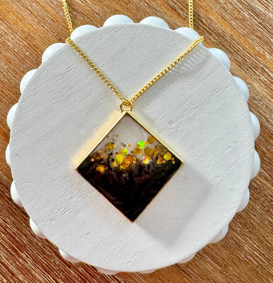 Gold Plated 18 inch Cable Link Chain Necklace with Black and Gold RESIN charm.